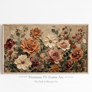 May include: A rectangular wall art piece featuring a textured impasto floral arrangement in shades of beige, cream, terracotta, and muted green. The artwork is enclosed in a thin wooden frame. Text below reads: Premium TV Frame Art The Pink Collective Co.