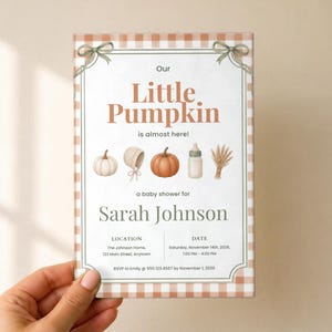 May include: A rectangular baby shower invitation card with a light orange gingham border and green ribbon accents. The text reads Our Little Pumpkin is almost here! Sarah Johnson, location, date, and RSVP details are clearly printed.