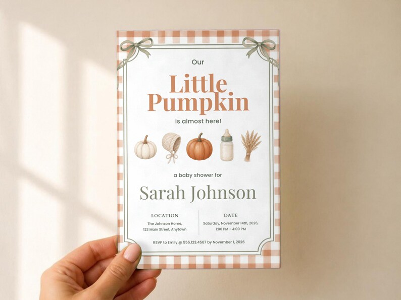 May include: A rectangular baby shower invitation card with a light orange gingham border and green ribbon accents. The text reads Our Little Pumpkin is almost here! Sarah Johnson, location, date, and RSVP details are clearly printed.