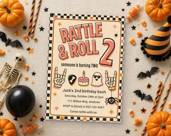 May include: A rectangular birthday invitation card with a black and white checkered border. The text reads RATTLE & ROLL 2, someone is turning TWO, Jack's 2nd birthday bash, Saturday, October 24th at 3pm, 111 Willow Way, Anytown, RSVP to 555-123-4567.