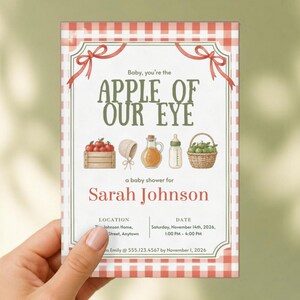 May include: A rectangular baby shower invitation with a red and white gingham border. The text reads: Baby, you're the APPLE OF OUR EYE, a baby shower for Sarah Johnson, location, date, and RSVP details. Illustrations include apples, a bonnet, and a bottle.