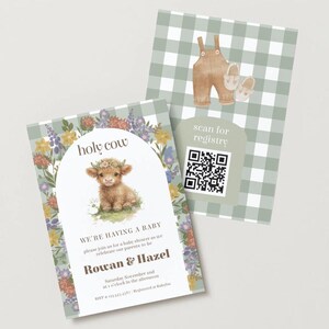 May include: Two rectangular baby shower invitation cards with a sage green gingham pattern. One card features a watercolor highland cow with a flower crown, floral border, and text reading holy cow, Rowan & Hazel. The other card shows overalls, shoes, and a QR code.