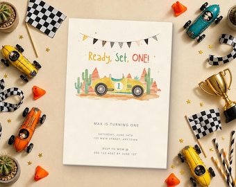 May include: A birthday invitation card featuring a yellow race car with the number one, desert landscape, and bunting. The text reads Ready, Set, ONE! Max is turning one, Saturday, June 14th, 123 Main Street, Anytown, RSVP to Mom at 555.123.4567 by June 1st.