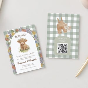 May include: Two rectangular cards with a sage green and white gingham pattern. The left card features a watercolor highland cow, floral arch, and text reading holy cow, we're having a baby, Rowan & Hazel. The right card displays baby overalls and a QR code.