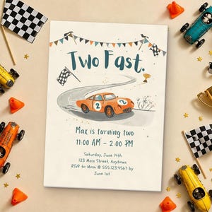 May include: A rectangular birthday invitation card featuring an orange race car with the number two, a winding track, checkered flags, and bunting. The text reads Two Fast, Max is turning two, 11:00 AM - 2:00 PM, Saturday, June 14th, 123 Main Street, Anytown, RSVP to Mom @ 555.123.4567 by June 1st.