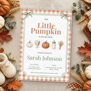 May include: A rectangular baby shower invitation card with a light orange gingham border, featuring the text Our Little Pumpkin is almost here, Sarah Johnson, and event details, decorated with illustrations of pumpkins, a bonnet, and a bottle.