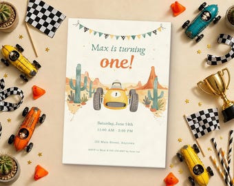 May include: A rectangular birthday invitation card featuring a yellow race car, desert landscape with cacti, and bunting. Text reads: Max is turning one! Saturday, June 14th, 11:00 AM - 2:00 PM, 123 Main Street, Anytown, RSVP to Mom at 555.123.4567 by June 1st.