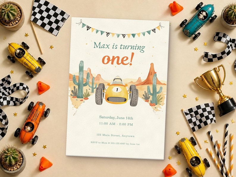May include: A rectangular birthday invitation card featuring a yellow race car, desert landscape with cacti, and bunting. Text reads: Max is turning one! Saturday, June 14th, 11:00 AM - 2:00 PM, 123 Main Street, Anytown, RSVP to Mom at 555.123.4567 by June 1st.