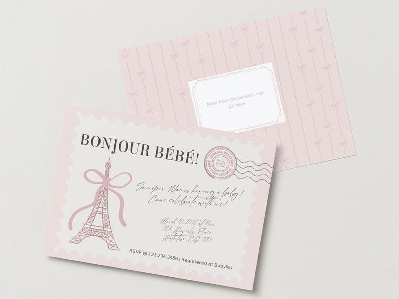May include: A light pink baby shower invitation card featuring a scalloped edge, a pink Eiffel Tower illustration with a bow, and a circular postmark stamp. The text reads BONJOUR B&Eacute;B&Eacute;!, Juniper Mae is having a baby!, Come celebrate with us!, March 10, 2026 at 11am, 123 Beverly Place, Waterbury, CT 123, RSVP 123.234.3456, Registered at Babylist.