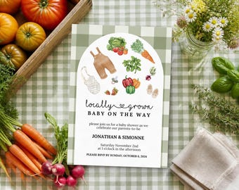 May include: A baby shower invitation card with a green gingham border featuring watercolor illustrations of baby clothes, vegetables, and fruit. The text reads: locally grown BABY ON THE WAY, please join us for a baby shower as we celebrate our parents-to-be, JONATHAN & SIMONNE, Saturday November 2nd at 1 o'clock in the afternoon, PLEASE RSVP BY SUNDAY, OCTOBER 6, 2024.