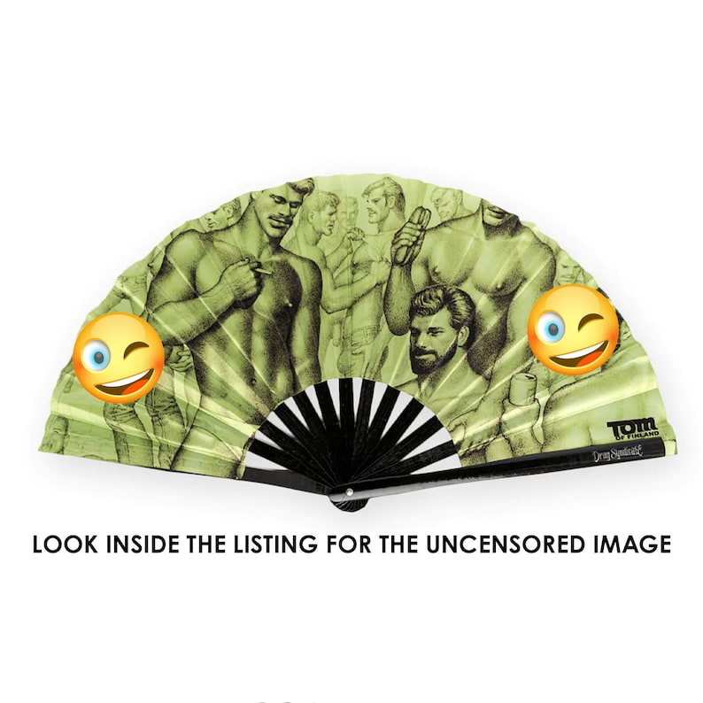 May include: A green folding fan with a black handle and a colorful illustration of men. The fan has a Tom of Finland logo and the text "Drag Syndicate".