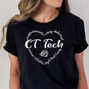 May include: A black t-shirt with a white circle graphic that says "CT Tech" with the words "compassionate, caring, dedicated, warm, reliable, loyal, kind, loving" surrounding the text.