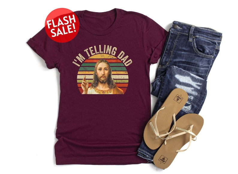 a t - shirt with a picture of jesus on it