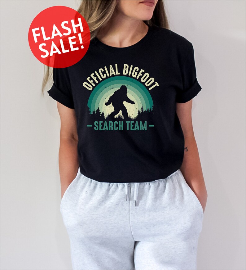 a woman wearing a black shirt with a bigfoot search team on it