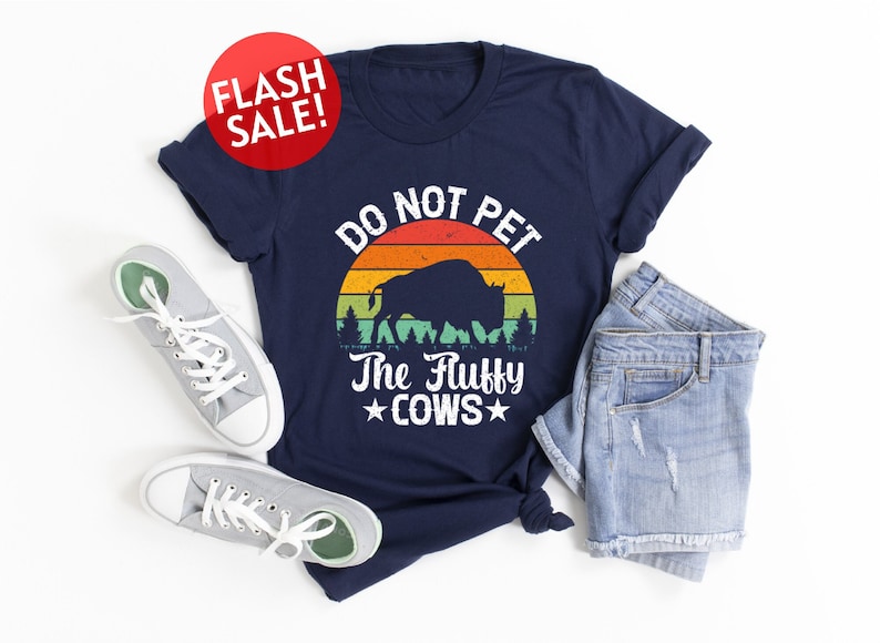 a t - shirt that says do not pet the furry cows