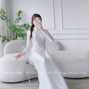 Plain white ao dai with pearls Lụa vân gỗ áo dài Pre made ao ai for bridesmaids Plain long dress Wedding day checklist No pants image 1