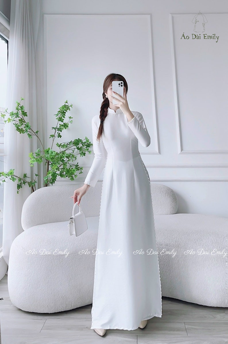 Plain white ao dai with pearls Lụa vân gỗ áo dài Pre made ao ai for bridesmaids Plain long dress Wedding day checklist No pants image 2