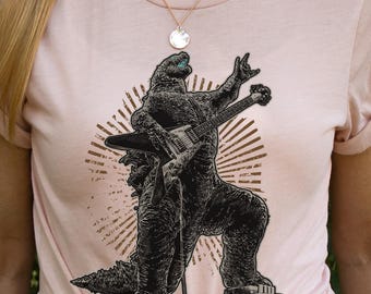 Rockstar Monster Dinosaur Shirt | Cute Animal Tshirt | Guitarist Shirts | Wild Dino Gifts | Funny Shirts | Guitar Player Shirt | Rocker Tee