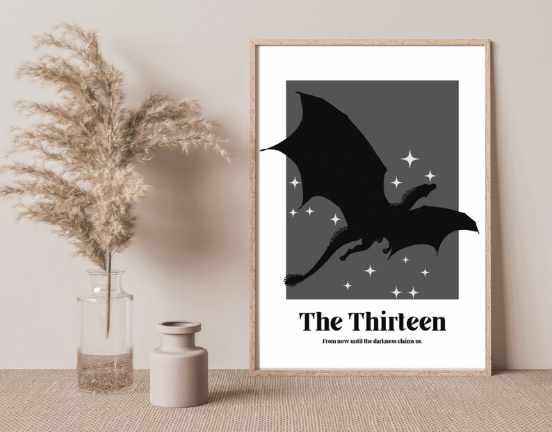 May include: A black and white poster featuring a silhouette of a dragon flying against a grey background with white stars. The poster has the text "The Thirteen" and the phrase "From now until the darkness claims us".