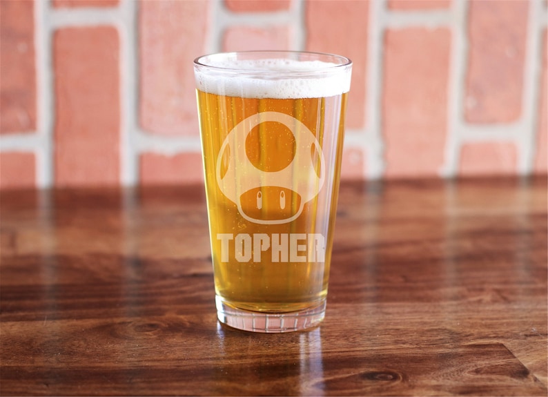 TheGalaxyOfGeeky Pint Glass