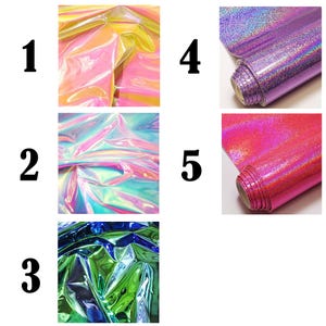 May include: Five rolls of craft vinyl sheets labeled one through five. Numbers one, two, and three show crinkled, iridescent, metallic surfaces in yellow-pink, blue-pink, and green-blue. Numbers four and five show purple and pink glitter rolls.