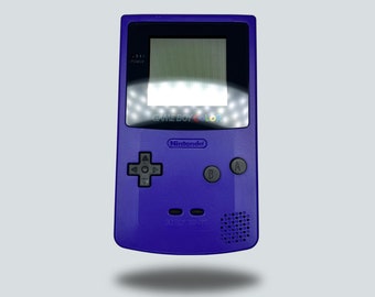 Grape Purple GameBoy Color — Original Screen | Fully Refurbished & Cleaned | Authentic Nintendo GBC