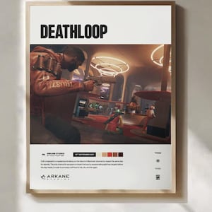 May include: A framed poster for the video game "Deathloop." The poster features a scene from the game with a character holding a gun. The title "DEATHLOOP" is at the top. The Arkane Studios logo is at the bottom.