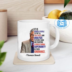 Thomas Sowell It Is Usually Futile To Try To Talk Facts Socialism Coffee Mug – Famous Economist Travel Bottle