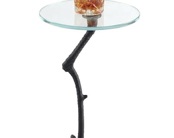 Mesita auxiliar Flamingo negra hecha a mano, con tapa de cristal transparente.