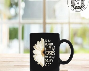 in a world full of roses be a daisy 11 oz mug