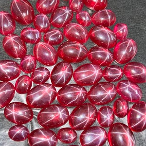 Colibrated Lindy Star Sapphire Wholesale Lindy Star Red Oval Electric 6 Star Gemstone - Bulk Lindy Star Cabochon - For Making Ring Earrings.