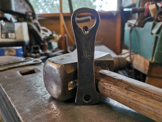 A real blacksmith hammered this from wrought iron — every one is slightly different, and it looks like it belongs in a Viking longhouse.
