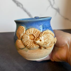 Beach Lover's Delight: Ocean-Inspired Shell Coffee Cup