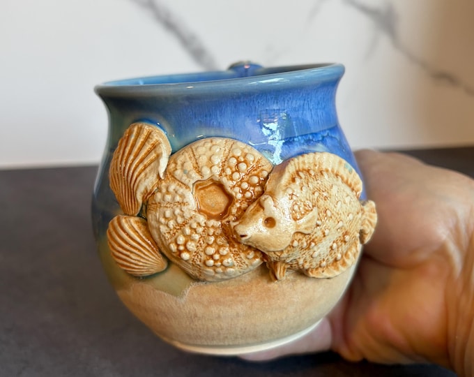 Beach Lover's Delight: Ocean-Inspired Shell Coffee Cup