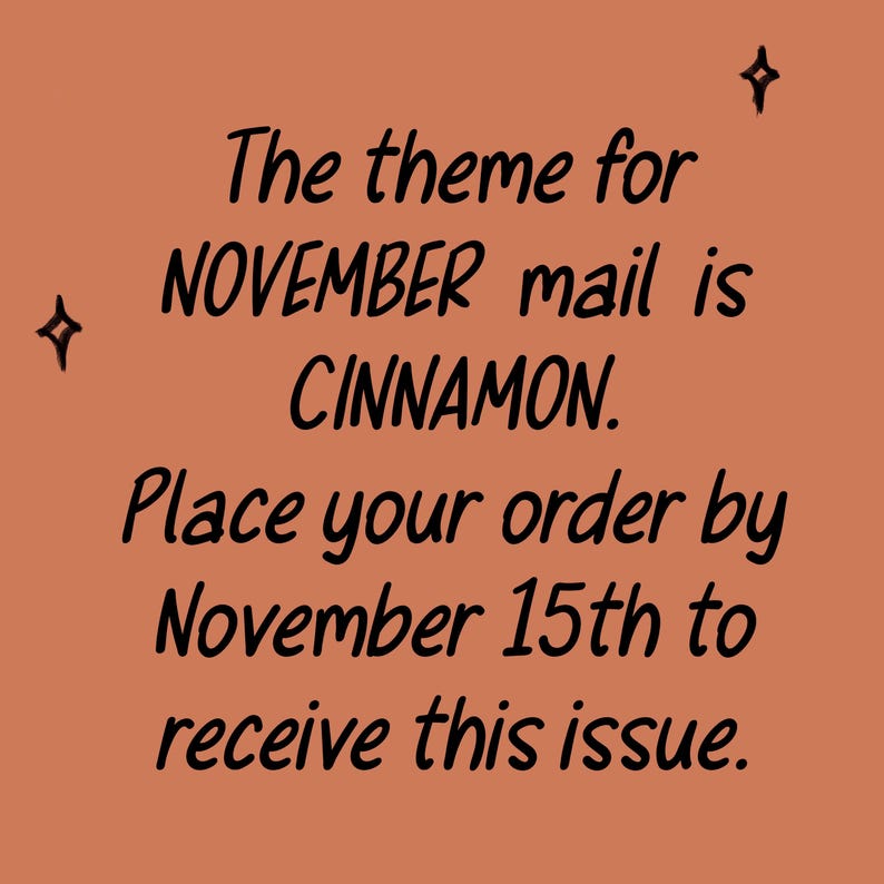 May include: A square terracotta-colored graphic with black text that reads: The theme for NOVEMBER mail is CINNAMON. Place your order by November 15th to receive this issue. Two small black four-pointed star icons are positioned on the left and top right.