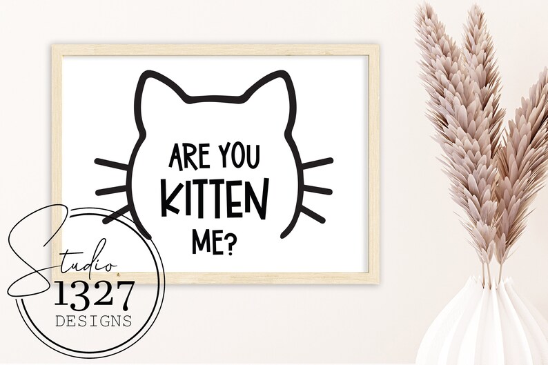 May include: Black and white printable wall art featuring a cat silhouette with the text "Are you kitten me?"