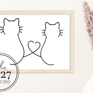 May include: Line art print of two cats with their tails intertwined to form a heart shape. The print is in a light wood frame and is hanging on a white wall.