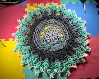 Ijzige kleuren kleedje