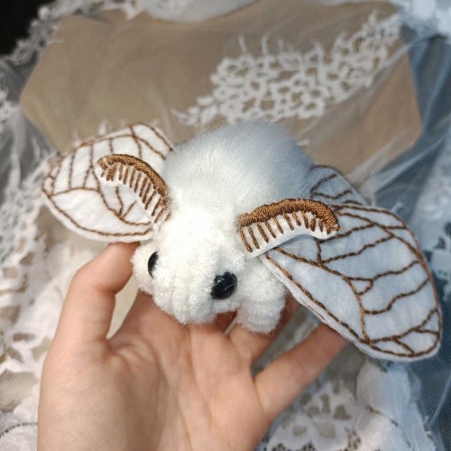 white moth plush