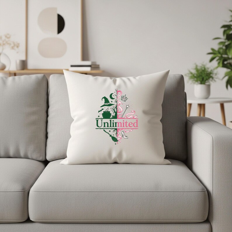 May include: White square pillow with a green and pink graphic design. The design is split in half, with a witch-themed side and a fairy-themed side. The word "Unlimited" is printed in the center.