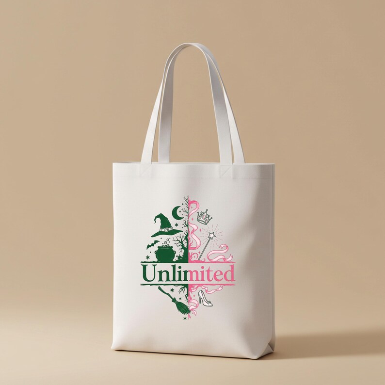 May include: White tote bag with a green and pink graphic design. The design includes a witch hat, cauldron, wand, and the word "Unlimited". The bag has two white handles.
