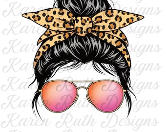 May include: A digital illustration of a woman's face with black hair styled in a messy bun, wearing pink aviator sunglasses and a leopard print headband. The text "WRESTLING MOM" is displayed in bold, black letters at the bottom.