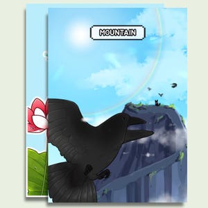Puede incluir: Dos cuadernos ilustrados. Uno presenta un cuervo negro en vuelo contra un cielo azul con un arcoíris y la palabra "MOUNTAIN". El otro cuaderno muestra una flor de loto rosa y hojas verdes.