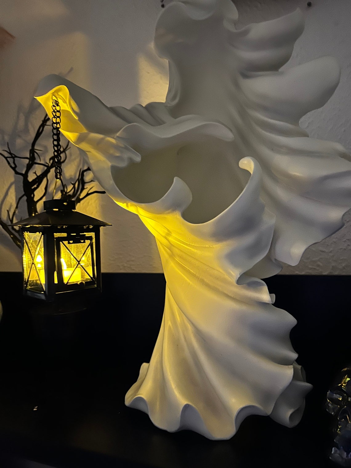 cracker barrel ghost holding lantern