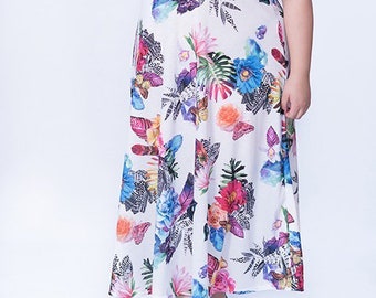 Fabric with a floral print with a lot of drape. Perfect for skirt, blouses or dresses. light tones