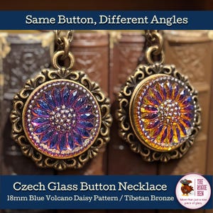 May include: Two Czech glass button necklaces with an 18mm blue volcano daisy pattern in Tibetan bronze settings. The necklaces are displayed against a backdrop of antique books. The text "Same Button, Different Angles" is at the top.