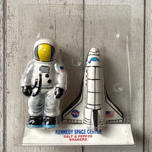 Vintage Kennedy Space Centre Astronaut and Space Shuttle Salt & Pepper Shakers