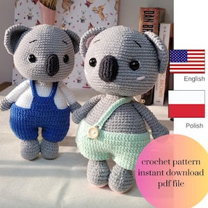 May include: Two handmade crochet koala bears. One koala wears blue overalls over a white shirt, the other wears mint green overalls. Both have gray bodies, black eyes, and black noses. The image includes text that says "crochet pattern instant download pdf file."