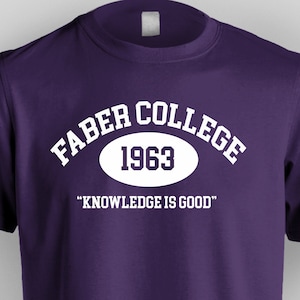 May include: Purple t-shirt with white text that reads "Faber College 1963 "Knowledge is good."