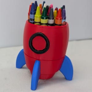 Rocket Crayon Holder for Kids, Artemis Moon Mission Gift, 3D Printed Space Desk Organizer Red, Blue and Black
